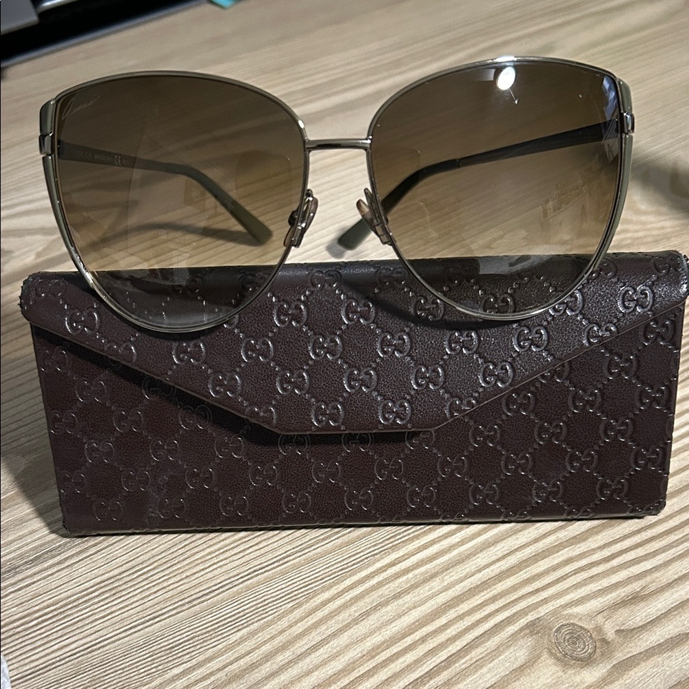 Gucci Silver Frame Sunglasses with Brown Lenses